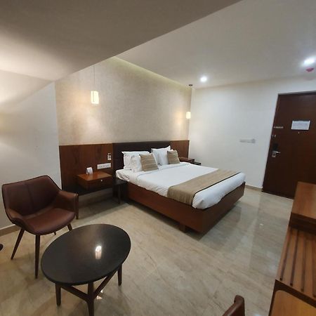 Hotel Aida Коттаям Экстерьер фото