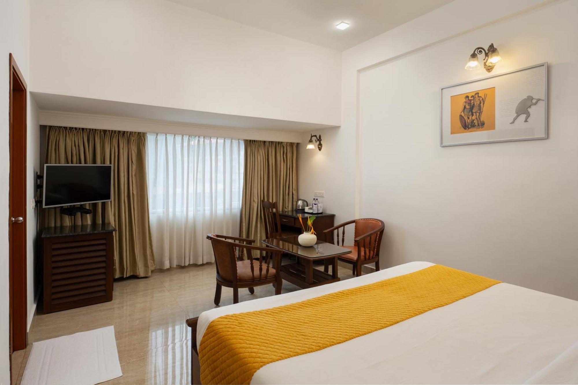 Hotel Aida Коттаям Экстерьер фото